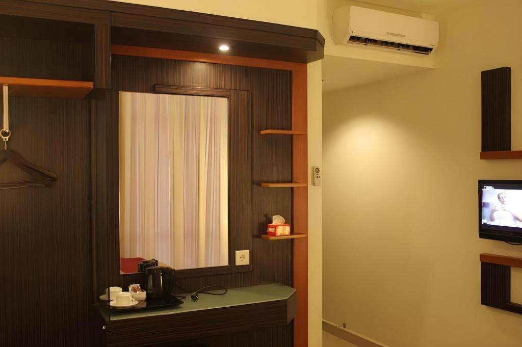 Travello Hotel Manado Extérieur photo