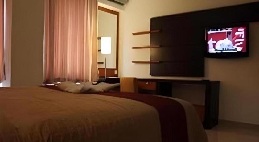 Travello Hotel Manado Extérieur photo